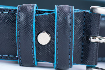 Details on black classic belt with blue line