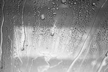 water streaks and droplets on window