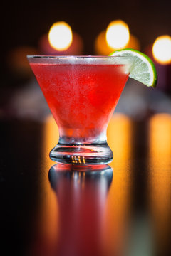 Red Cocktail With Lime