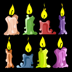 Set candles of different sizes and colors