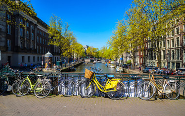 Bikes on the bridge in  Amsterdam, Netherlands. Canals of Amsterdam