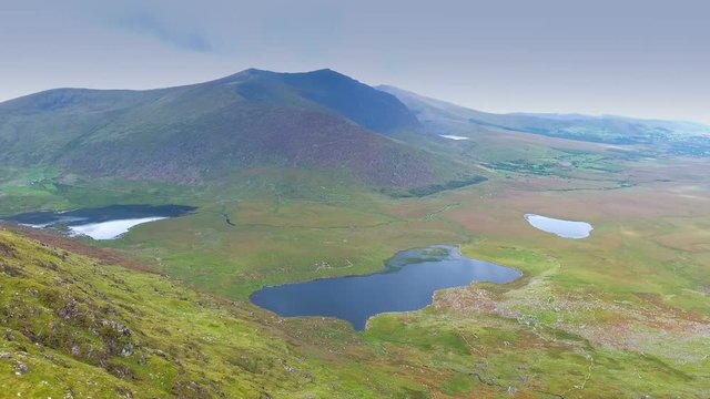 The view of the mountain and the small lakes where can be seen when on the top of the SkyRoad in Ireland