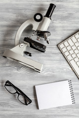 lab assistant desk with microscope top view