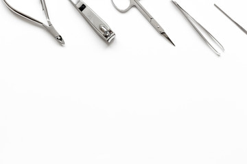 nail care - manicure set on white background top view