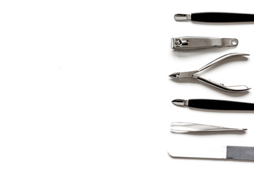 nail care - manicure set on white background top view