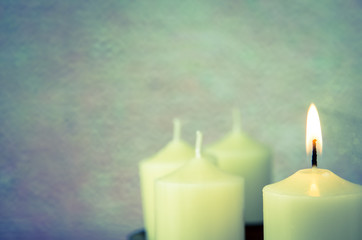 burning candle in advent decoration