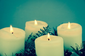 four burning candles