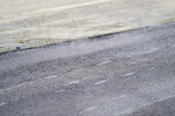 Asphalt paving with steel roller