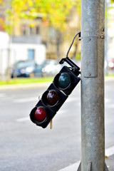 Broken traffic lights pole