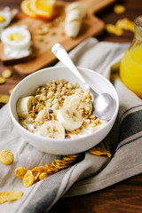 healthy breakfast bowl of yogurt with granola and eggs