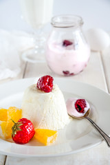 sweet breakfast with ice cream and berries close up