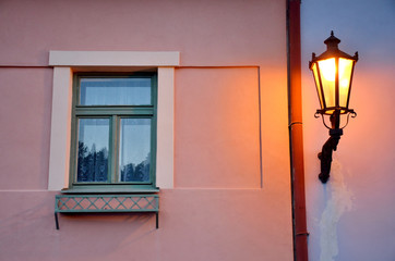 Glory lamp and the window in old city