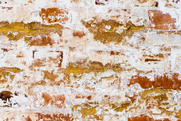 Stone brick wall of the old building, background texture.