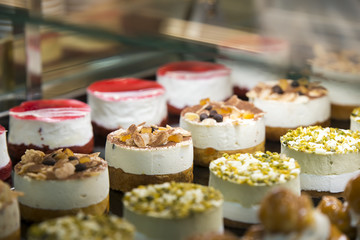 showcase with homemade cakes in a shop