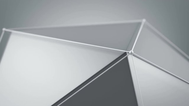 White polygon shape waving close-up. Computer generated smooth animation with motion blur. Abstract technology 3D render seamless loop 4k UHD (3840x2160)
