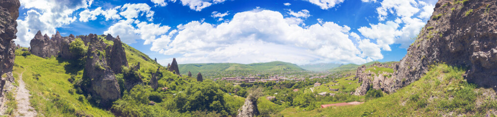 View on mountain cliffs and magnificent cloudy sky on background. Exploring Armenia