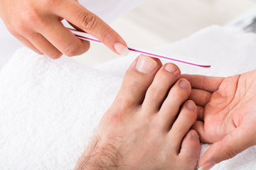 Manicurist Doing Pedicure