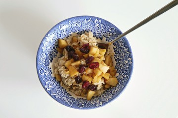 Healthy brown rice pudding, dessert with fruits on top