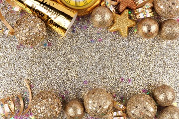 New Years Eve double border of streamers and decor over a glittery background