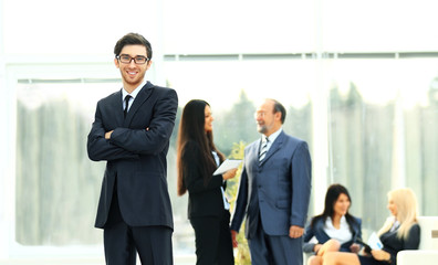 boss on the background of business team in office