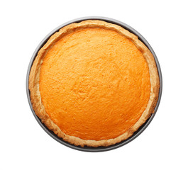 Delicious pumpkin cake in baking dish on white background