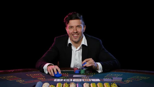 Online poker player has won at the casino. Close up