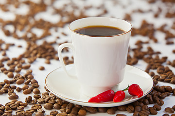coffee in coffee cup with natural grains
