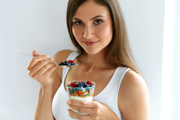 Healthy Breakfast. Woman With Glass Of Yogurt, Berries And Oats