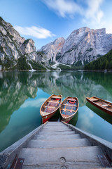 Obraz premium Boats on the Braies Lake ( Pragser Wildsee ) in Dolomites mounta