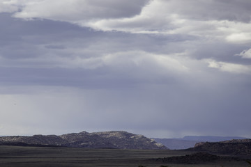 Fototapeta na wymiar Clouds over a dry desert