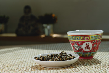 Still life with Chinese teacup and plate