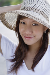 Young woman wearing hat