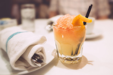 Absinthe Frappe with shaved ice and orange peel - 126599031