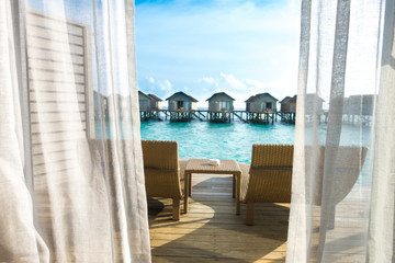 Fototapeta na wymiar Beautiful tropical Maldives resort hotel with beach and blue wat