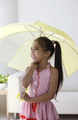 A young girl with an umbrella © Alexander