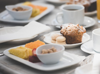 Delicious breakfast with fruits and sweets