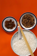 Still life of porridge with spicy minced pork and pickled vegetable