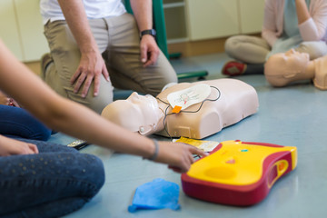 First aid cardiopulmonary resuscitation course using automated external defibrillator device, AED.