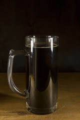 Glass with dark kvass