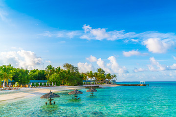 Beautiful tropical Maldives island with white sandy beach and se