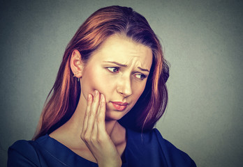 young woman with toothache crown problem pain
