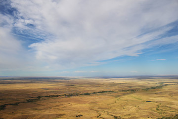 Flat expanse of the Great Plains seen from atop Bear Butte in South Dakota.
