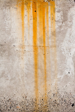 Drip of rust on concrete background, industrial abstract