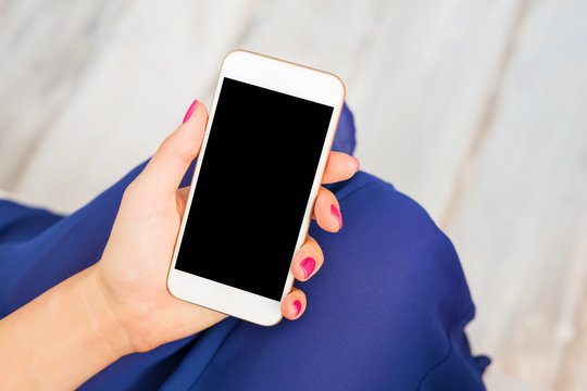 Woman holding smartphone