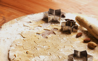 Gingerbread dough with molds for baking and cinnamon, selective focus