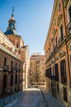 Street Calle Pretil de los Consejos near the The Iglesia del Sacramento (Church of the Sacrament) in Madrid, Spain