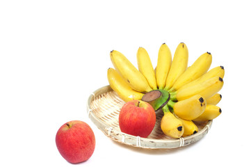 Lady Finger or egg banana and apple in rattan basket