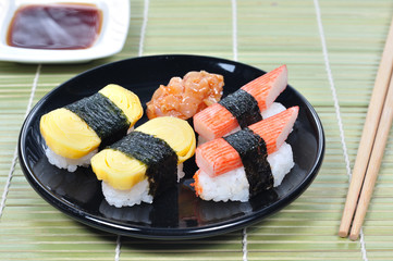 Japanese sushi with chopstick, Asian food.