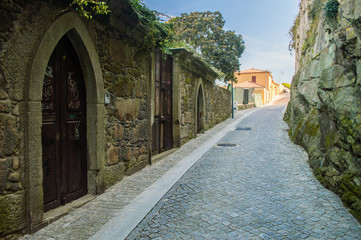 Old street with stone walls in Porto, Portugal