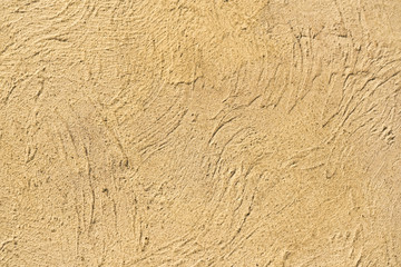 Beige relief stone wall, background, texture